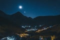 Night sky scene with the Milky Way and stars above Imlil village. Small village in high atlas mountains in Morocco near