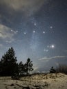 Night sky stars Cygnus and Lyra constellation clouds and snow nightscape Royalty Free Stock Photo