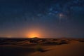 night sky with stars and meteor showers over the dunes of the sahara desert Royalty Free Stock Photo