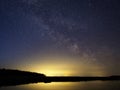 Night sky stars and milky way over lake