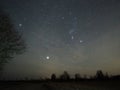 Night sky stars Orion constellation and clouds nightscape