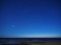 Night sky stars over sea venus auriga constellation