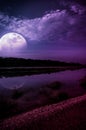 Night sky and super moon at riverside. Serenity nature background. Royalty Free Stock Photo