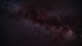Night sky timelapse, many stars with satellites passing by, Milky way in region of Aquila and Sagitta constellation with bright