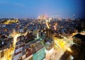 Night skyline of vibrant Macao City in blue twilight, with landmark Macau Tower Convention & Entertainment Center