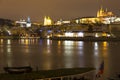 Night Snowy Christmas Prague Lesser Town With Gothic Castle Above River Vltava, Czech Republic