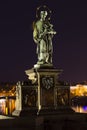 Night bronze St. John of Nepomuk Statue on Prague Charles Bridge, Czech republic Royalty Free Stock Photo
