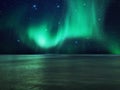 aurora borealis blue green clouds splash   night starry sky     and  cosmic nature landscape Royalty Free Stock Photo
