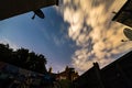 Night stars sky view from British backyard with laundry and satelite dishes around it