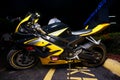 Night stock image of a yellow and black Suzuki gsxr sport bike motorcycle Royalty Free Stock Photo