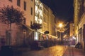 Night street and blurred people walking on the streets