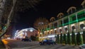 Night street with cars and mansions