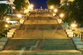 Night street view of Odessa city, Ukraine, Potemkin stairs near the Primorskiy boulevard, walking people Royalty Free Stock Photo