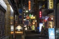 Night street view in red light area with bar and pubs in Osaka, Royalty Free Stock Photo