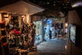 Night streets with many open souvenir shops at Thira town Royalty Free Stock Photo