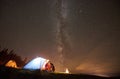 Night summer camping in the mountains under night starry sky Royalty Free Stock Photo