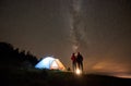 Night summer camping in the mountains under night starry sky Royalty Free Stock Photo