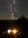 Night summer camping in the mountains under night starry sky Royalty Free Stock Photo