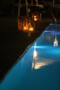 Night swimming pool and candles