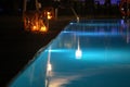 Night swimming pool and candles Royalty Free Stock Photo