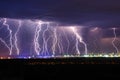 Night thunder lightning over the city sky