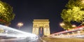 Arc de Triomphe and car light trails at night