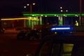 night time. blue police car with selective focus and blur bokeh Royalty Free Stock Photo