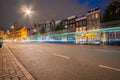 Night time in the city, lights, street markings and red light streams from passing traffic Royalty Free Stock Photo