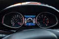 Night time dashboard of modern car. Screen display of car status warning light on dashboard panel symbols which show the Royalty Free Stock Photo