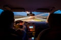 Night time highway from inside car with motion blurred speeding Royalty Free Stock Photo