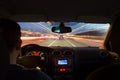 Night time highway from inside car with motion blurred speeding Royalty Free Stock Photo