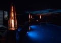 Night time home outdoor patio and pool patio Royalty Free Stock Photo