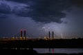 Night time image of lightning near a cable stayed bridge