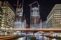 Night-time shot of construction at Canary Wharf, London, United Kingdom