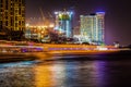 Night time skyline with high buidings by the Chao Praya river in Bangkok, Thailand. Royalty Free Stock Photo