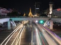 Night time and speed of light of golden octagon of Sule pagoda at Square foot overpass on the crossroad of Anawrahta Rd. and Sule