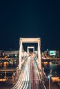 Night time traffic over the Elisabeth bridge. It crosses Danube river and connect Buda and Pest together. Budapest, Hungary Royalty Free Stock Photo