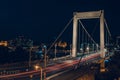 Night time traffic over the Elisabeth bridge. It crosses Danube river and connect Buda and Pest together. Budapest, Hungary Royalty Free Stock Photo