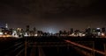 Night time view of commuter trains under Nelson Mandela Bridge in Braamfontein Johannesburg CBD Royalty Free Stock Photo