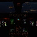 Night time view of CRJ 200 Flight Deck