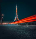 Night-time view of the Eiffel Tower in Paris, France, illuminated with streaks of light Royalty Free Stock Photo