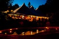 Night time wedding tent with a pool reflection Royalty Free Stock Photo