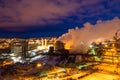 Night top view of a steel mill. Smog, smoke and flame from chimneys Royalty Free Stock Photo