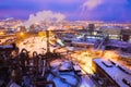 Night top view of a steel mill. Smog, smoke and flame from chimneys Royalty Free Stock Photo