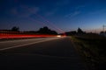 night track with blurred lights from the headlights of cars.long exposure time.