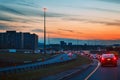 Night traffic, cars on highway road on sunset evening night in busy city Royalty Free Stock Photo