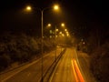 Night traffic lights. Timelapse video of dark highway road with lighten lamps