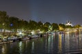 Night Traffic at Paris Famous Monuments Seine River Boats Docks and Bridge Royalty Free Stock Photo