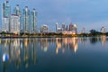 Night twilight city apartment building with water reflection on lake Royalty Free Stock Photo