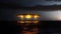 At night a UFO with a shiny hull flies high in the sky_003 Royalty Free Stock Photo